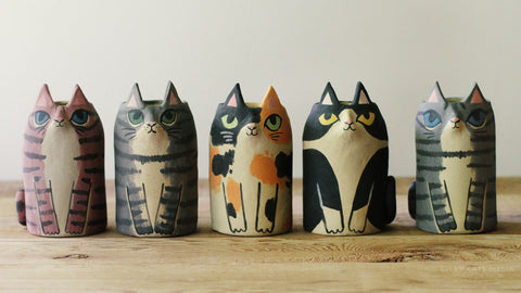 What do you call a cat that likes to go bowling?